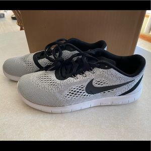 Grey and Black Nike Free Run